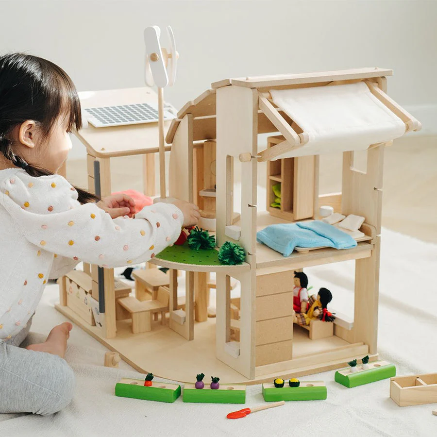 Green Dollhouse with Furniture by Plan Toys - Image 2