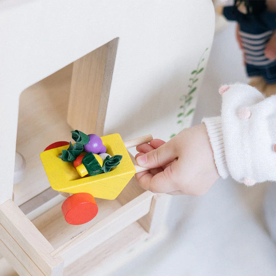 Green Dollhouse with Furniture by Plan Toys - Image 4