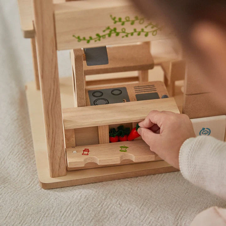 Green Dollhouse with Furniture by Plan Toys - Image 8