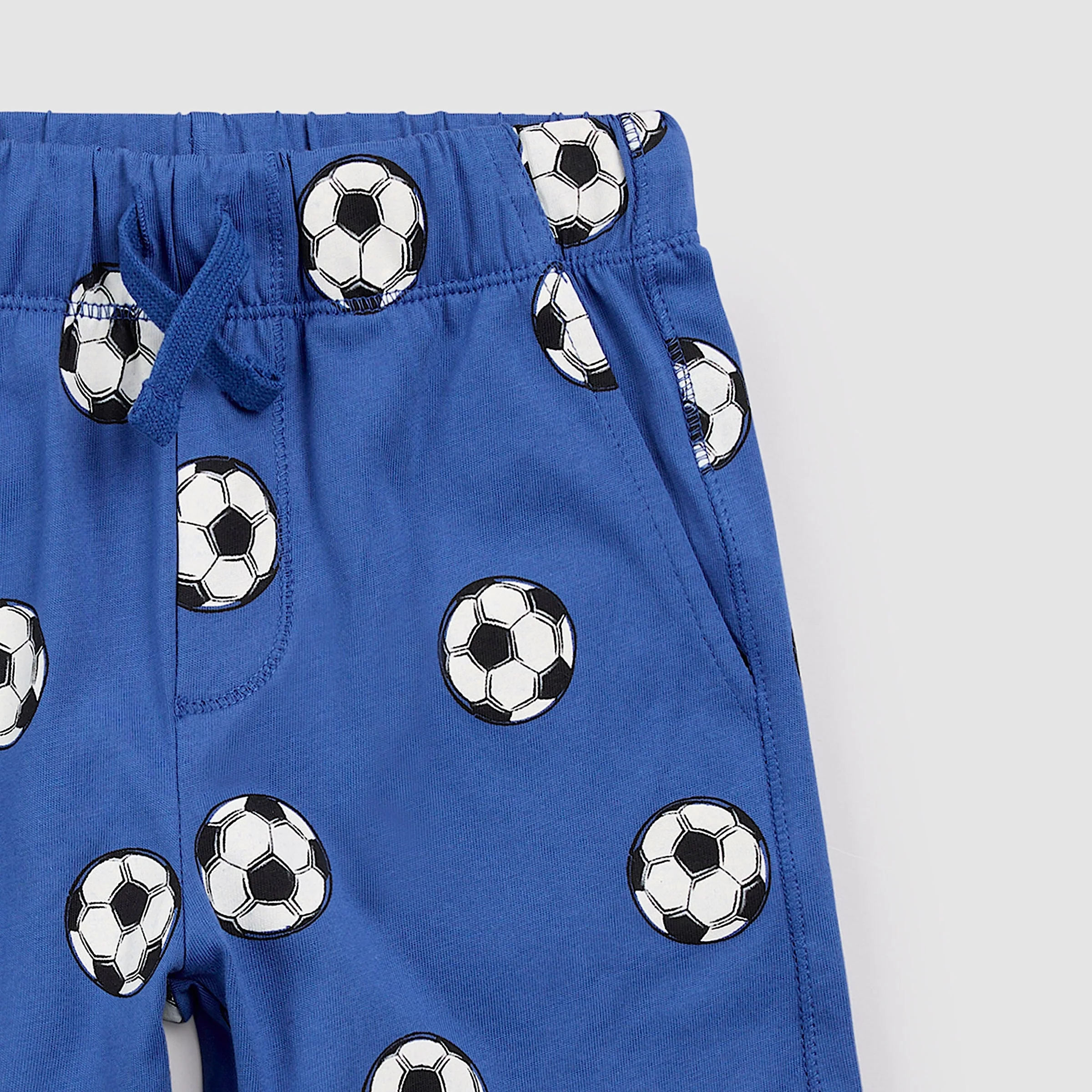 Knit Shorts - Soccer Balls on Royal Blue by miles the label. - Image 2