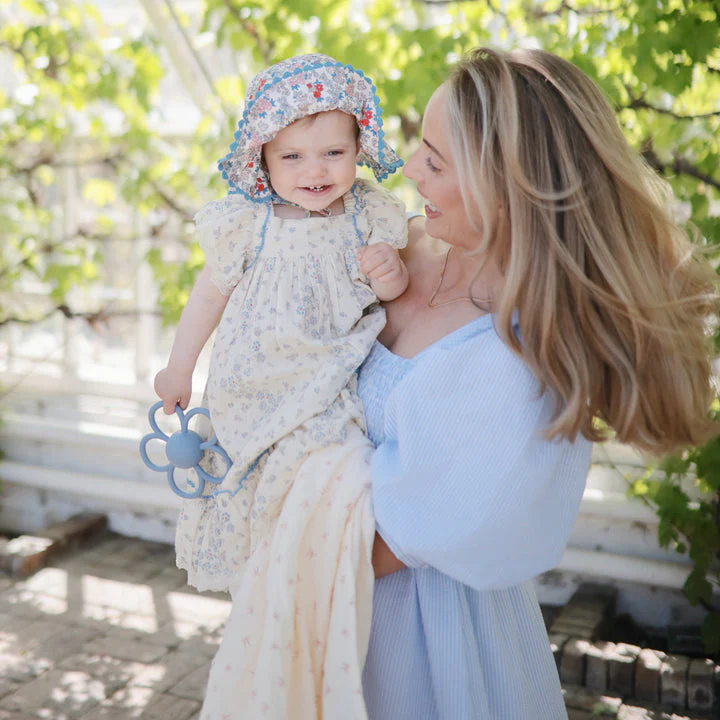 Organic Muslin Swaddle - Bows by Mushie & Co - Image 3