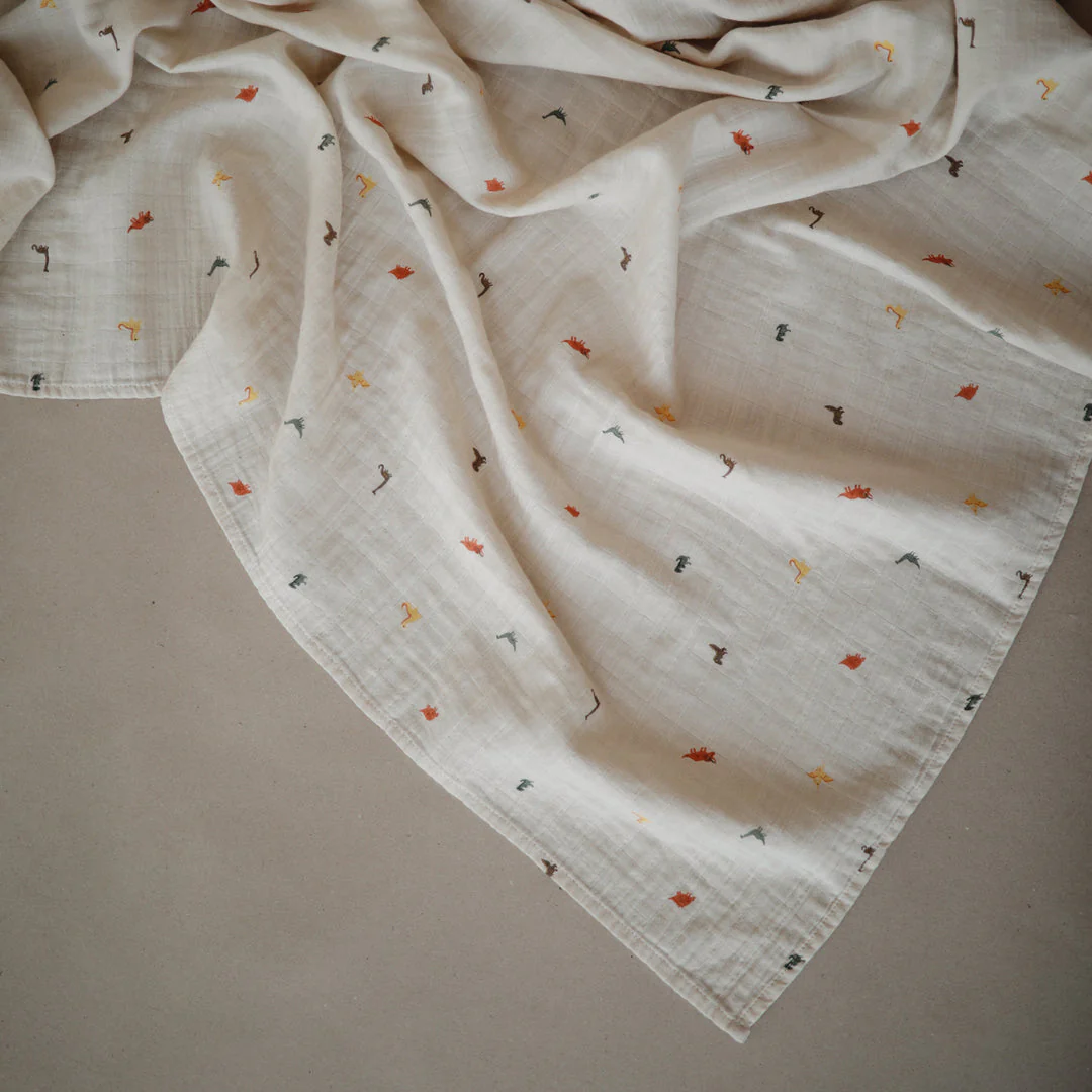 Organic Muslin Swaddle - Dinosaurs by Mushie & Co - Image 4