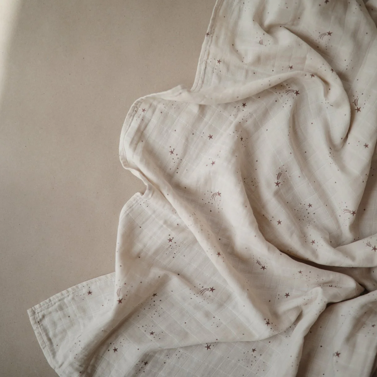 Organic Muslin Swaddle - Falling Stars by Mushie & Co - Image 2