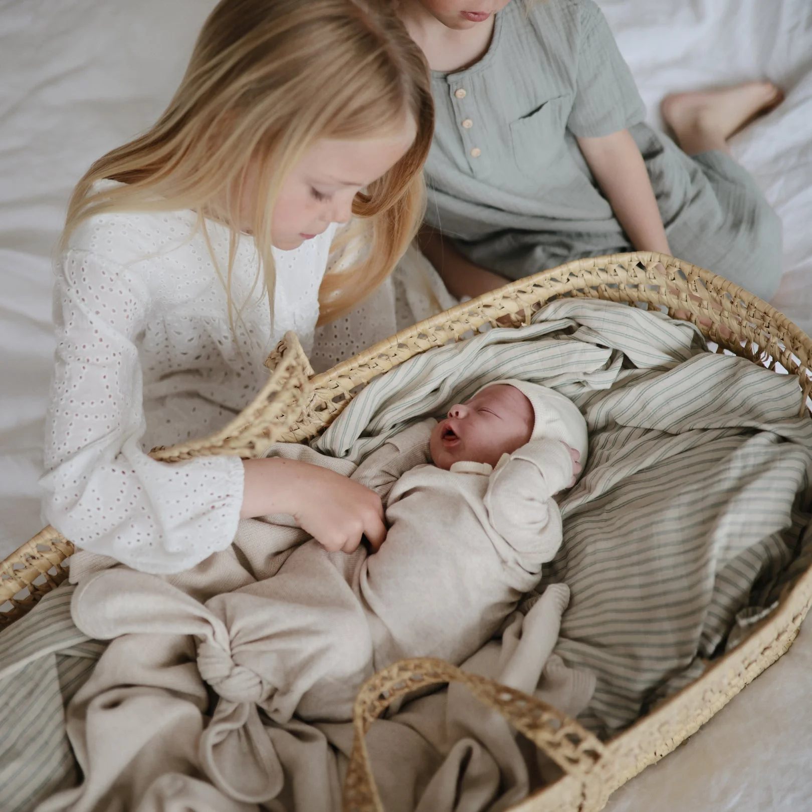 Organic Muslin Swaddle - Sage Stripe by Mushie & Co - Image 3
