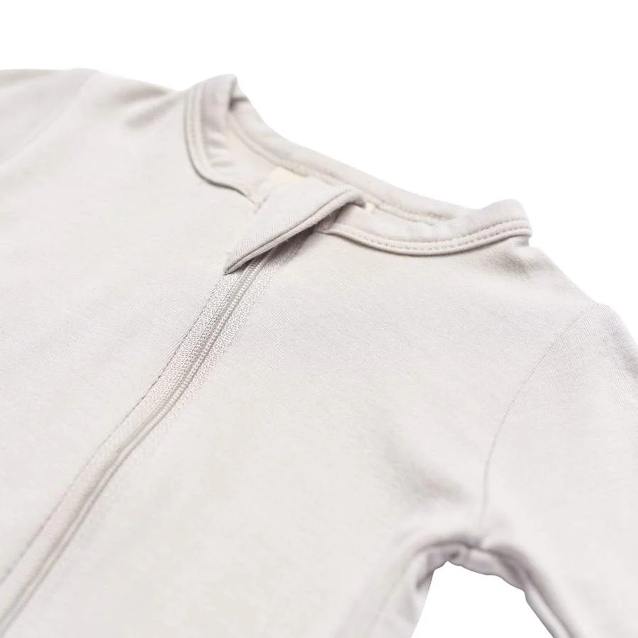 Solid Footie with Zipper - Oat by Kyte Baby - Image 3
