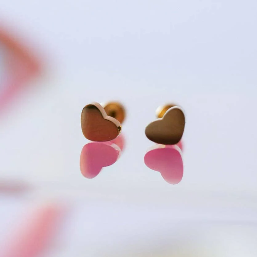 Tiny Classic Heart Earrings by Pierced - Image 2