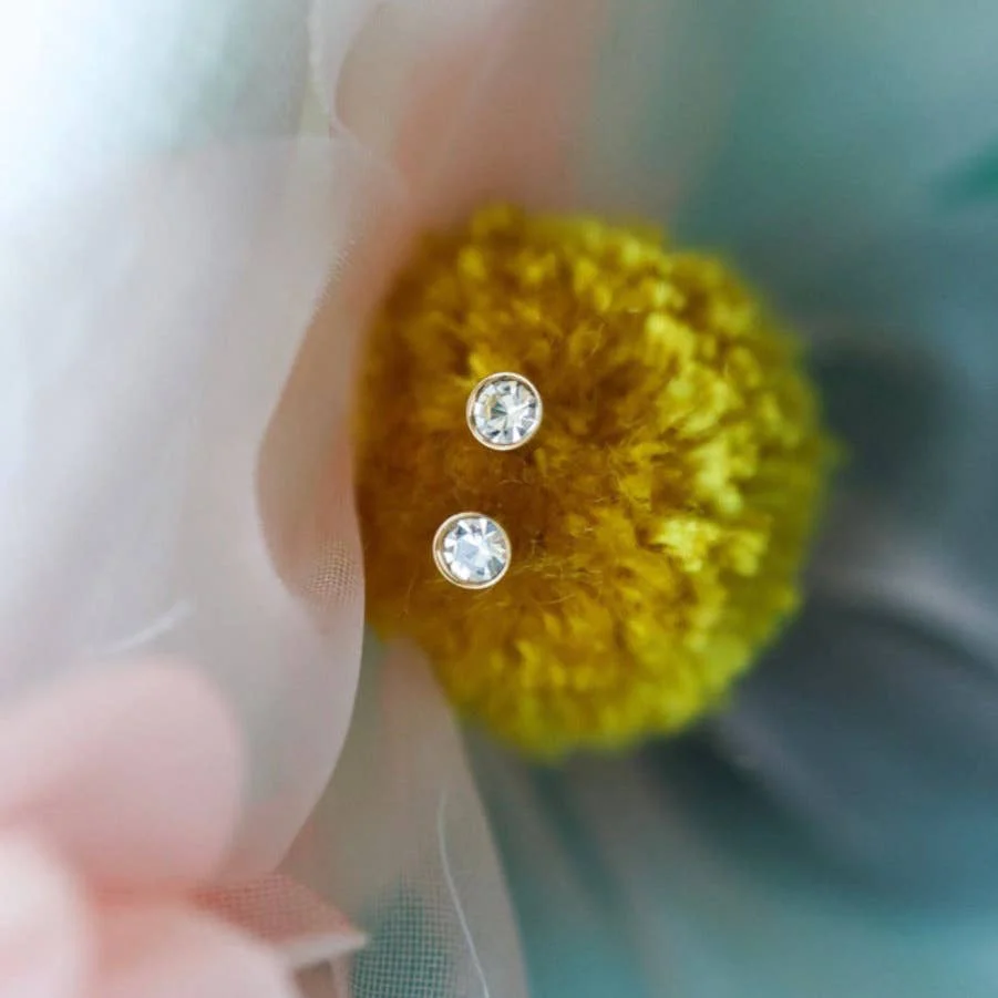 Tiny Diamond Earrings by Pierced - Image 2