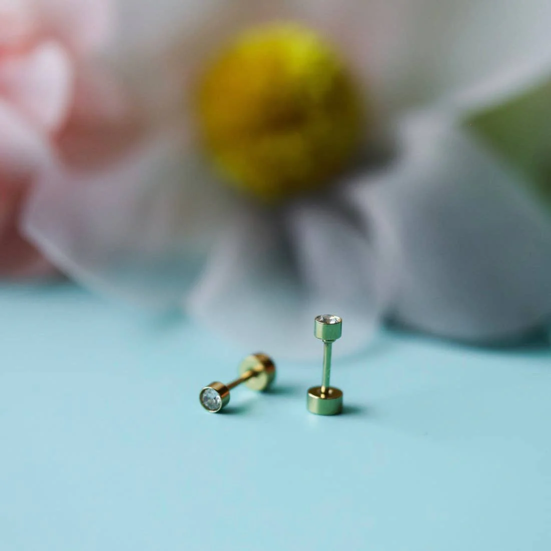 Tiny Diamond Earrings by Pierced - Image 3